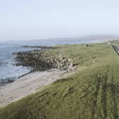 Part of a modular water treatment plant being transported on Tiree in 2024