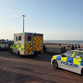 Another view of police and ambulance at Portobello Promenade.