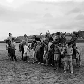 Children on donkeys at St Andrews Beach in July 1961.