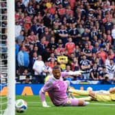 Lawrence Shankland scores in Scotland’s win over Curacao.
