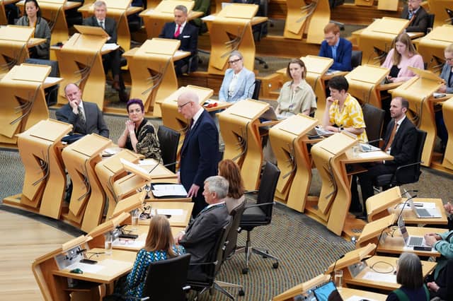 Holyrood urged to act on debt
