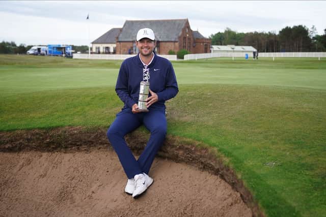 Royal Birkdale’s Greg Holmes shows off the trophy after winning the Scottish Men’s Open at Gailes Links in Ayrshire