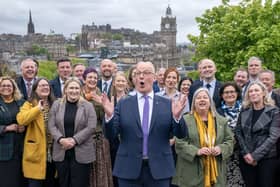 First Minister John Swinney celebrating the SNP's election victory.
