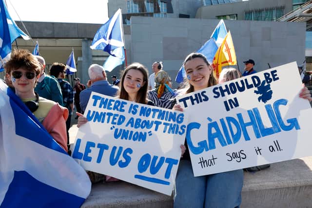 Independence supporters stage a rally outside the Scottish Parliament in support of a second referendum as MSPs vote on the issue (Picture: Jeff J Mitchell)