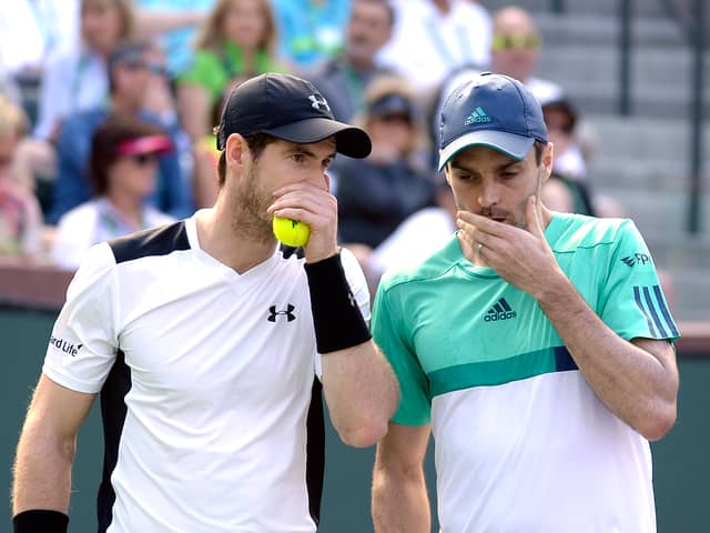 Colin Fleming, right, pictured playing a doubles match  with Andy Murray in the 2016 BNP Paribas Open at Indian Wells Tennis Garden in California