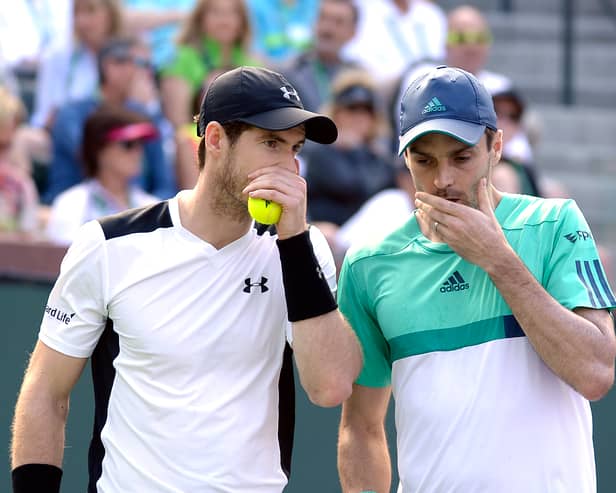 Colin Fleming, right, pictured playing a doubles match  with Andy Murray in the 2016 BNP Paribas Open at Indian Wells Tennis Garden in California