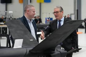 Keir Starmer looks at drones as he visits defence contractor Stark in Swindon yesterday (Picture: Alastair Grant/pool)