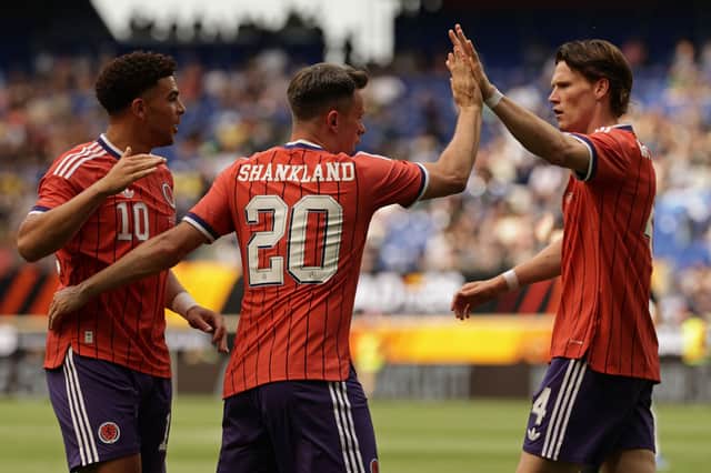 From left, Che Adams, Lawrence Shankland and Scott McTominay scored for Scotland against Bolivia.