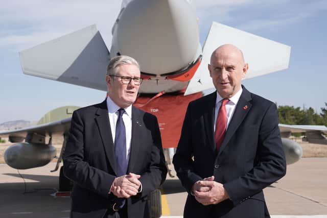 Prime Minister Sir Keir Starmer and former defence secretary John Healey with a UK Typhoon fighter jet at a military base in Ankara, Turkey, in October 2025.