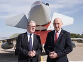 Prime Minister Sir Keir Starmer and former defence secretary John Healey with a UK Typhoon fighter jet at a military base in Ankara, Turkey, in October 2025.