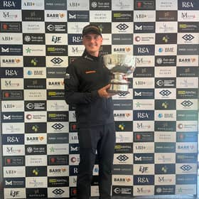 Sam Locke shows off the trophy after winning the Scottish Par 3 Championship at Paul Lawrie Golf Centre on the outskirts of Aberdeen