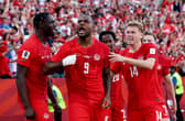Cyle Larin celebrates with teammates after scoring for Canada during the team's first match against Bosnia and Herzegovina. 