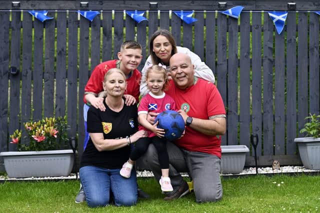 Elane and Abdellah with their daughter, Nadia, and two of their grandchildren, Sam, 11, and Layla, two. Picture: John Devlin