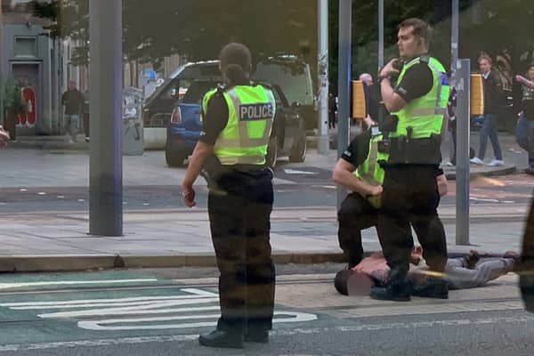 Police have arrested a man following a "series of incidents" around Edinburgh in which five people were injured. 