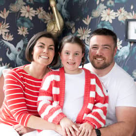 Yasmine Fagerson with Glasgow Warriors prop husband Zander, 30 and daughter Iona, at their home. Yasmine has told how their seven-year-old daughter's life has been transformed by wearing hearing aids