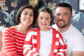 Yasmine Fagerson with Glasgow Warriors prop husband Zander, 30 and daughter Iona, at their home. Yasmine has told how their seven-year-old daughter's life has been transformed by wearing hearing aids