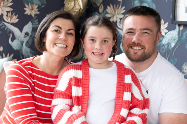 Yasmine Fagerson with Glasgow Warriors prop husband Zander, 30 and daughter Iona, at their home. Yasmine has told how their seven-year-old daughter's life has been transformed by wearing hearing aids