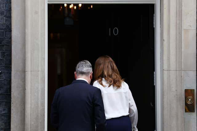 Keir Starmer and his wife Victoria head inside 10 Downing Street after he announced he would stand down as Prime Minister (Picture: Peter Nicholls)