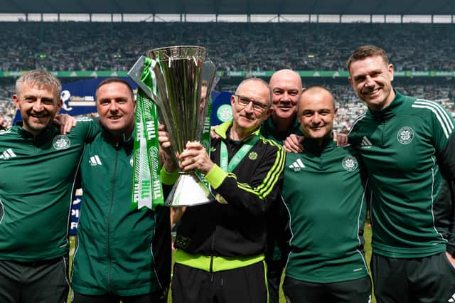 Celtic coach Gavin Strachan (far left( has left the club. He is pictured celebrating last season's Premiership title succes with manager Martin O'Neil, Mark Fotheringham, Stevie Woods, Shaun Maloney and Stephen McManus.