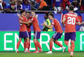 Players celebrate after John McGinn scored the winning goal in Scotland's opening World Cup match against Haiti (Picture: Justin Setterfield)