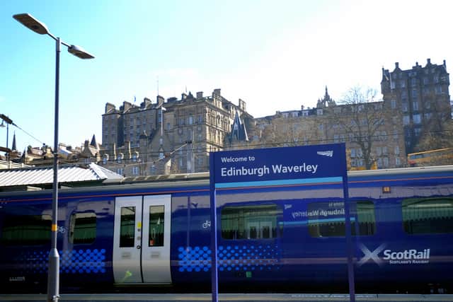 A ScotRail train on the platform at Edinburgh Waverley