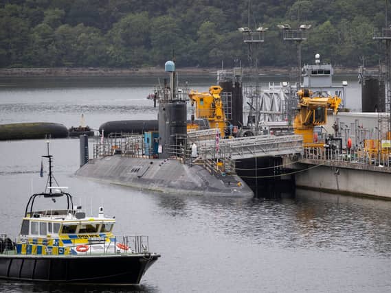 A submarine docked at the Faslane base