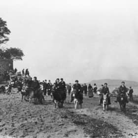 Edinburgh holidaymakers taking part in the donkey races on Cramond Beach in around 1900.