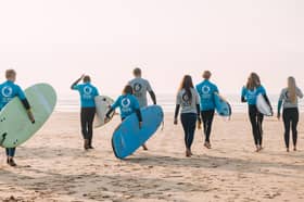 A Wave Project session takes to the water