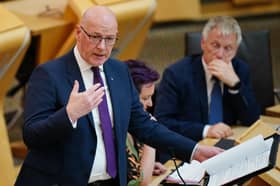 John Swinney during First Minister's Questions in Holyrood