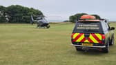 A child has been injured after falling from a cliff near Dunbar Swimming Pool