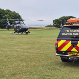 A child has been injured after falling from a cliff near Dunbar Swimming Pool 