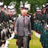 King Charles III inspects the guard of honour