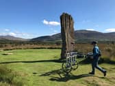 A researcher from Historic Environment Scotland explores the ground underneath Machrie Moor stone cirle on the Isle of Arran