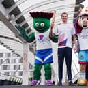 Duncan Scott with Team Scotland mascot Clyde, left, and 2026 Commonwealth Games mascot Finnie (Jane Barlow/PA)
