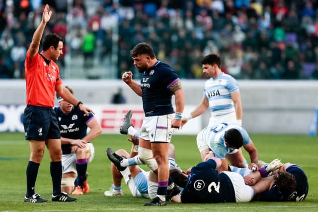 Scotland's Rory Sutherland celebrates as the grounded Ewan Ashman (No 2) scores a try against Argentina at the Madre de Ciudades Stadium in Santiago del Estero, on July 16, 2022.