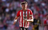 Rangers have signed former Sunderland captain Dan Neil on a three-year deal.
