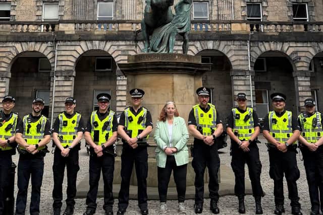Councillor Margaret Graham alongside some of the new city centre policing unit