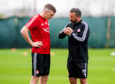 Derek McInnes speaks with Lewis Ferguson during an Aberdeen training camp in Dubai back in Janaury 2020. 