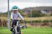 A primary pupil take part in Bikeability
