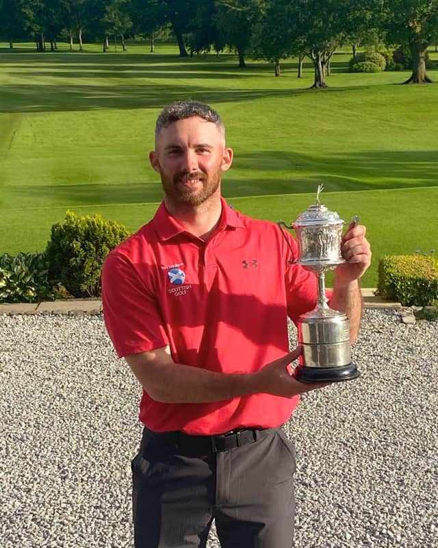 Murcar Links member Chris Somers shows off the Tennant Cup after landing an eight-shot victory in the historic event hosted by Glasgow Golf Club