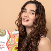 The Curlsmith Discovery Kit includes four premium curl care products designed to cleanse, moisturise, style and refresh curly hair. Photo posed by model.