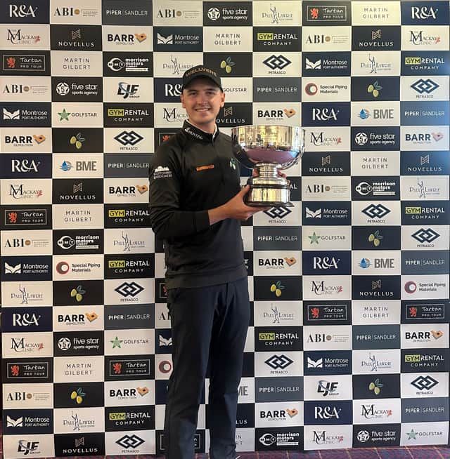 Sam Locke shows off the trophy after winning the Blairgowrie Perthshire Masters presented by The R&A