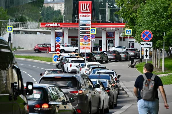 People queue to refuel their cars at a Lukoil petrol station in Moscow after Ukrainian drone strikes on Russian refineries and other infrastructure (Picture: Igor Ivanko)