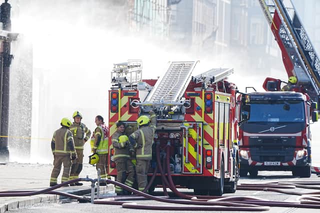 Firefighters at the blaze at the former Debenhams on Princes Street, Edinburgh