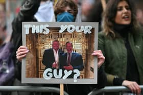 Protesters make a point outside a Reform UK rally in Leeds in March (Picture: Oli Scarff)
