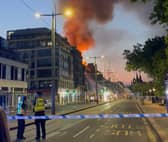 Princes Street has been cordoned off while firefighters battle a huge blaze