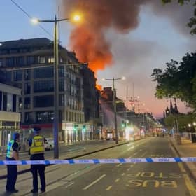 Princes Street has been cordoned off while firefighters battle a huge blaze