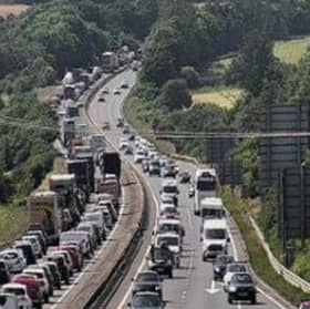 Huge queues are building on the City Bypass A720 in Edinburgh after a two-vehicle crash closed the westbound carriageway.