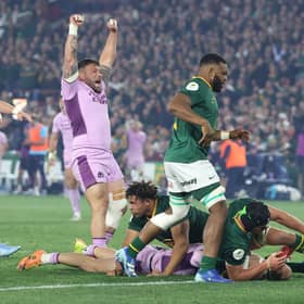 Rory Sutherland celebrates as Ben White stretches out to score Scotland's fourth try during the Nations Championship match against South Africa at Loftus Versfeld.