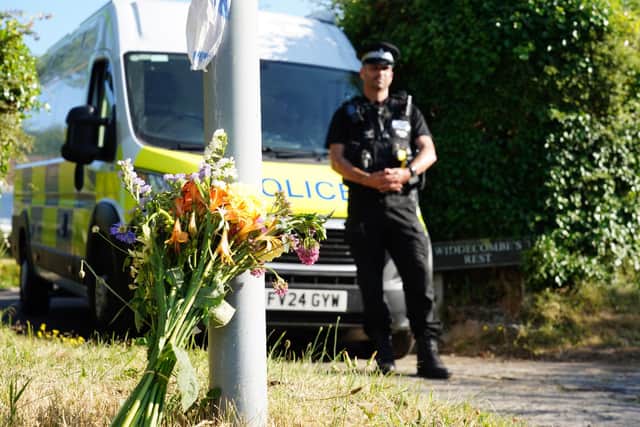 Police outside the house of Ann Widdecombe in Haytor in Dartmoor.